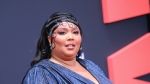 Lizzo Shimmers in Gucci Feather-Trim Navy Gown on BET Awards Red Carpet 2022