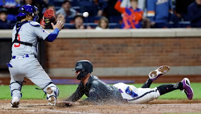 Mets' 9th-inning challenge ruled unsuccessful as Cubs steal a victory with wild ending