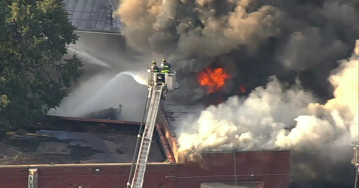 Fire at Jamaica, Queens tire shop burns for hours as crews use foam to battle blaze