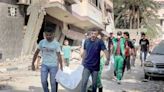 60 bodies found as battles rock Gaza City after mass evacuation order