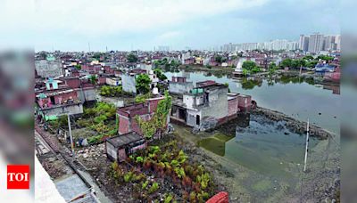Year after monsoon floods: Villagers in Noida still fear recurrence | Noida News - Times of India