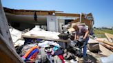 In a north Texas county, dazed residents sift through homes mangled by a tornado