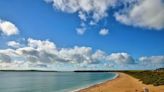 Warning to beachgoers after sewage flows into river near popular Welsh beach