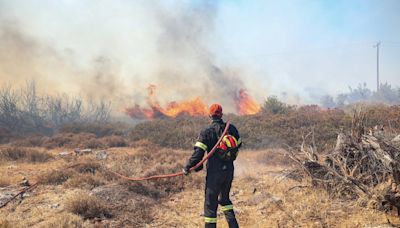 Greece wildfires - latest: One third of forest land in Athens area wiped out as 40C heat sparks flare-up fears