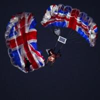Actors imitating Britain's late Queen Elizabeth II and James Bond parachute into the stadium during the opening ceremony of the London Olympics