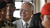 Halving of former Prime Minister Najib Razak’s jail sentence only half the story, shocked Malaysians learn