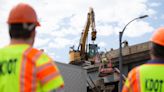 Workers are now replacing concrete walls on the aging Topeka viaduct where 30 tons of concrete fell