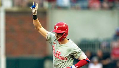 Trea Turner homers twice, Aaron Nola gets 100th career win in Phillies 8-6 victory over Braves