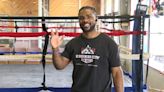 Boxing gym owner teaching people to fight with faith