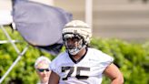 Taliese Fuaga knocking off the rust at left tackle in Saints rookie minicamp