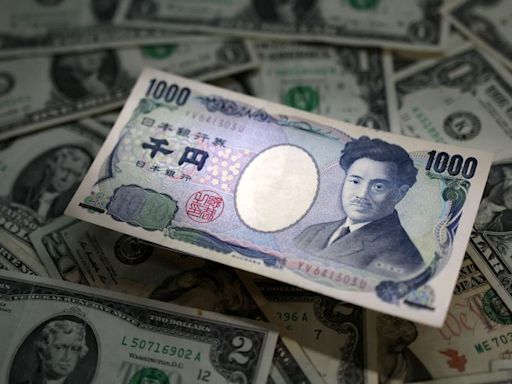 Yen weakens before BOJ rate decision, dollar gains ahead of Fed