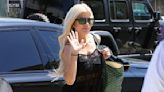 Tori Spelling heads to DWTS practice in leg warmers