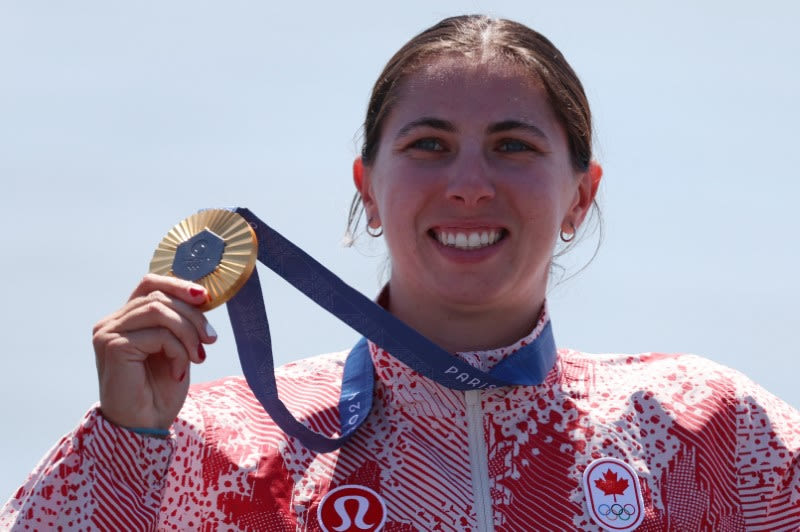 Olympics-Canoeing-Vincent gets her golden moment with narrow Olympic win