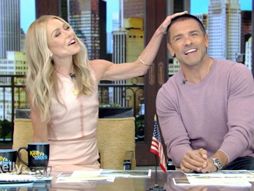 'Live': Kelly Ripa can't keep her hands off Mark Consuelos' head after he debuts new buzz cut