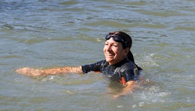 Paris mayor swims in Seine amid bacteria concerns before Olympics