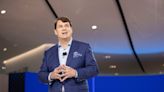 Ford CEO puts the brakes on the company's plan for fully autonomous cars, saying there's a long way to go before it can develop them at scale