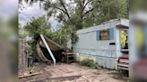 Topeka home split in half by tree after Tuesday storms