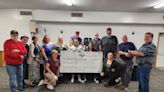 Salem Eagles present check to the Family Recovery Center