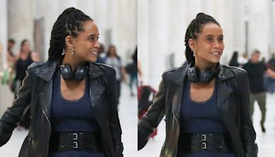 Taís Araujo desembarca no aeroporto usando um vestido elegante