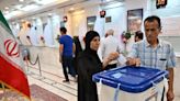 Iran Holds Runoff Presidential Vote Pitting Hard-line Former Negotiator Against Reformist Lawmaker - News18
