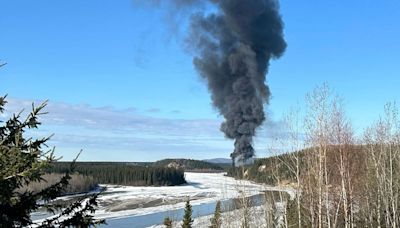 Pilot reported that plane carrying fuel caught on fire before fatal Alaska crash