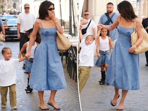 Kylie Jenner has chic mom moment in denim dress on Italy vacation with Stormi and Aire