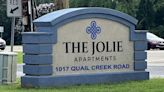 Man fights for life after found shot at Jolie Apartments