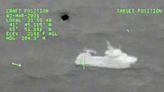 Dramatic video shows U.S. Coast Guard coming to rescue of sinking fishing boat