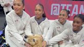 Beacon may need an agent, but you won't see the therapy dog with US gymnasts in Paris