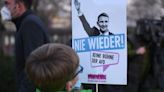 Far-right politician back in German court over use of Nazi slogan