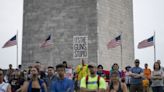 Thousands gather on National Mall to demand gun law changes