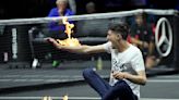 Laver Cup protester sets court, arm on fire, delays match