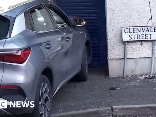 Belfast: Estate agency rammed in 'racially motivated' attack