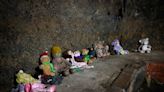 We visit creepy Nottingham pub cave where dolls are left for ghost of young girl