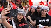 May Day protesters take up causes, and selfies, from Istanbul to Seoul