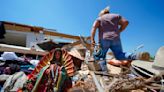 In a north Texas county, dazed residents sift through homes mangled by a tornado