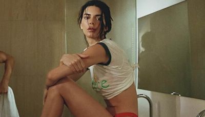 Kendall Jenner SHOCKS fans by posing with a naked man
