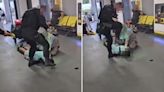 Shock moment cop kicks man in face & stamps on his HEAD at Manchester Airport