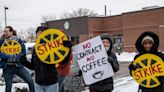 Starbucks union is using billboards, a brass band, and a butter sculpture to pressure board members from Nike, Land O'Lakes and Lego