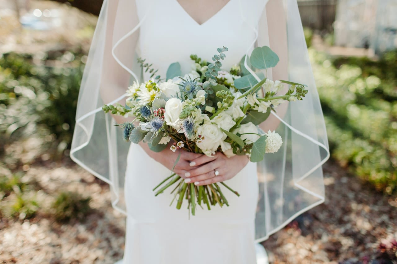 Bride ‘brands’ bridesmaids with her name during wedding