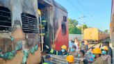 A fire inside a parked train kills 9 in southern India