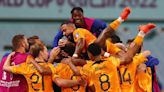 Soccer-Dutch full backs show the way to the quarter-final