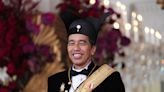 Indonesia's president, who mingles with people and listens to Metallica, still popular in last term