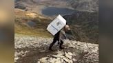 Ex-soldier completes three peaks challenge with fridge on his back