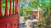 Transport to an 1800s garden oasis within this $1.7M Santa Fe home