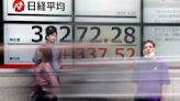 Stock market today: Asian shares mostly rise to start a week full of earnings, Fed meeting