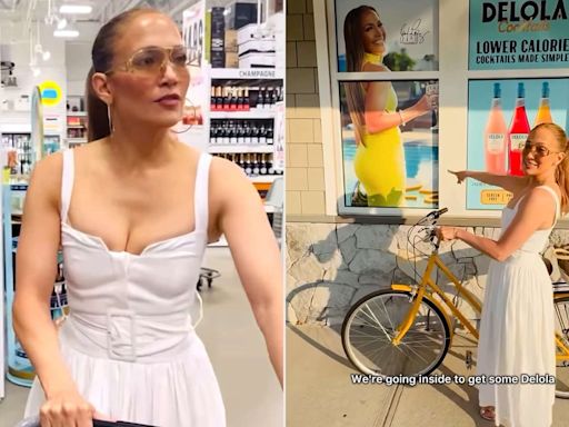 Jennifer Lopez Rides Her Bike to Shop for Her Delola Cocktails in the Hamptons — and Signs Bottles for Customers