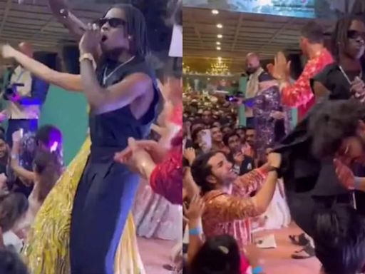 ... Down' singer Rema's jacket during his performance at Anant Ambani, Radhika Merchant's wedding goes viral - WATCH | Hindi Movie News - Times of India