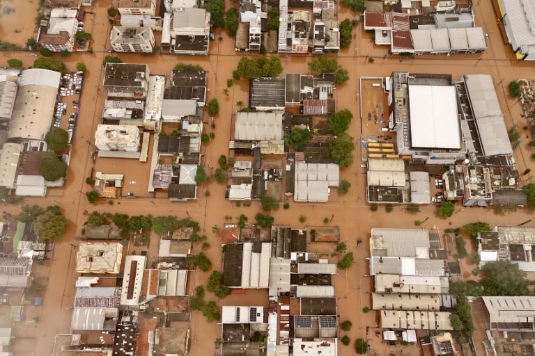 Race against time to rescue Brazil flood victims after dozens killed