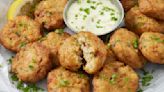 Everything We Know About The History Of Crab Cakes